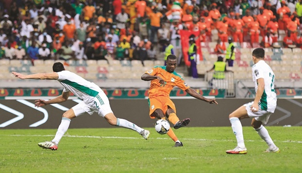 Ivory Coastu2019s Nicolas Pepe scores their third goal against Algeria in the Africa Cup of Nations in Douala, Cameroon, yesterday. (Reuters)
