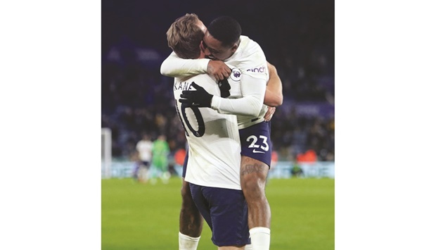 Tottenham Hotspuru2019s Harry Kane (left) celebrates with Steven Bergwijn after winning against Leicester City in Leicester. (AFP)