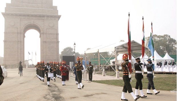 A soldier carrying the eternal flame from India Gate to the National War Memorial in New Delhi.