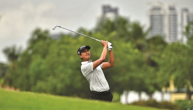 Sadom Kaewkanjana of Thailand hitting a shot during round three of the SMBC Singapore Open yesterday. (AFP)