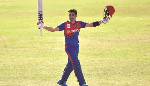 Afghanistan opener Rahmanullah Gurbaz celebrates reaching his century against the Netherlands during their ODI at Asian Town Cricket Stadium in Doha yesterday.