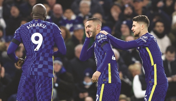 Chelseau2019s Hakim Ziyech celebrates with teammates after scoring against Tottenham Hotspur in their Premier League match at the Stamford Bridge in London yesterday. (Reuters)