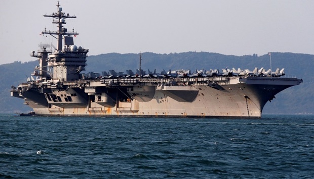US Navy aircraft carrier, USS Carl Vinson, docks at a port in Danang, Vietnam.  REUTERS file photo, March 5, 2018