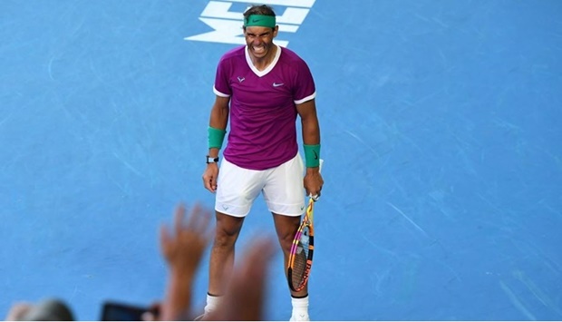Spain's Rafael Nadal celebrates winning the men's singles quarter-final match against Canada's Denis Shapovalov on day nine of the Australian Open tennis tournament in Melbourne on January 25, 2022.