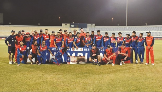 Afghanistan and the Netherlands players pose after the conclusion of the one-day international series at the Asian Town Stadium in Doha yesterday.