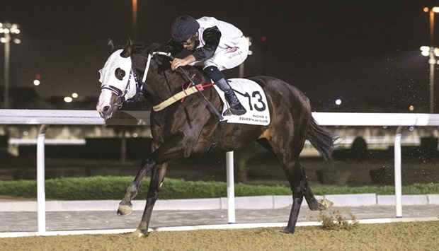 Faleh Bughanaim rides Sidcot Swallet to Wadi Al Sail Cup victory at the Al Rayyan Racecourse yesterday. PICTURES: Juhaim