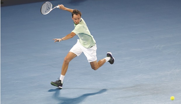 Russiau2019s Daniil Medvedev plays a forehand during his quarter-final match against Canadau2019s Felix Auger-Aliassime at the Australian Open in Melbourne yesterday. (Reuters)