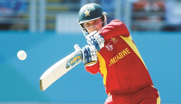 Zimbabweu2019s Brendan Taylor hits a four during the World Cup match against India at Eden Park in Auckland in this March 14, 2015 file photo. (Reuters)