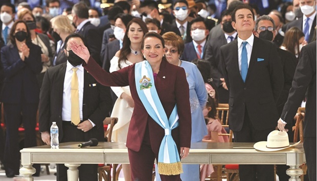 Castro waves after swearing in during her inauguration ceremony in Tegucigalpa.
