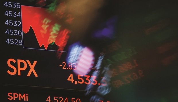 Stock market information on a monitor in the New York Stock Exchange. In another week of severe equity turbulence, the S&P 500 saw three of the biggest intraday reversals of the decade, Microsoft Corp swung 15% in 15 hours, and stock volatility doubled.