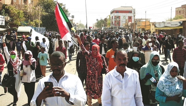 Sudanese demonstrators take part in a rally to protest against last yearu2019s military coup, in the capital Khartoum, yesterday.