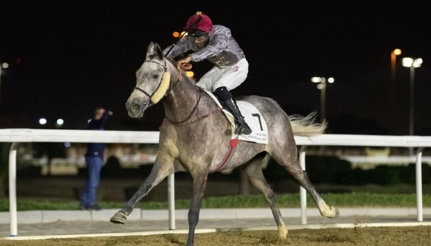 Jockey Faleh Bughanaim leads Al Shaqab Racingu2019s Um Taj to Umm Al Zubar Cup victory at the Al Rayyan Racecourse