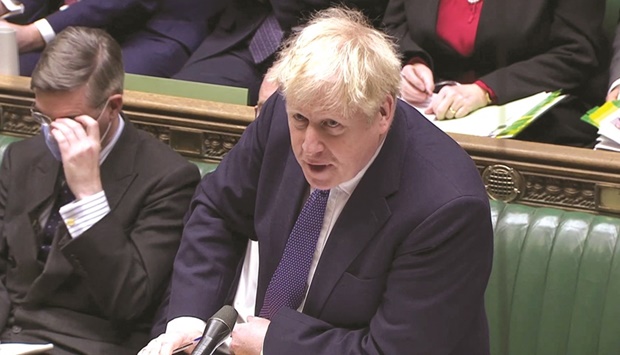 British Prime Minister Boris Johnson speaks during the weekly question time debate at Parliament in London, yesterday.