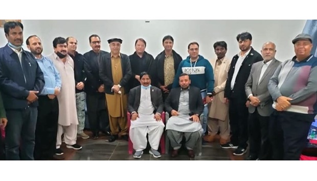 Chaudhary Ajmal with members of the Pakistani community.