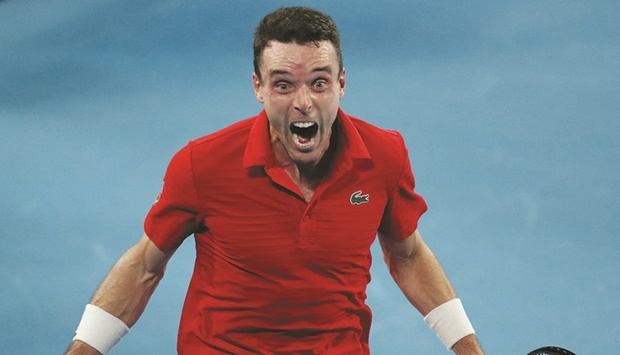 Spainu2019s Roberto Bautista Agut celebrates after his win over Polandu2019s Hubert Hurkacz in the ATP Cup semi-final in  Sydney yesterday. (Reuters)