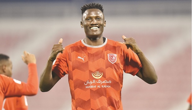 Al Duhail forward Michael Olunga celebrates after scoring against Al Arabi during the QNB Stars League match at the Grand Hamad Stadium yesterday. PICTURES: Noushad Thekkayil