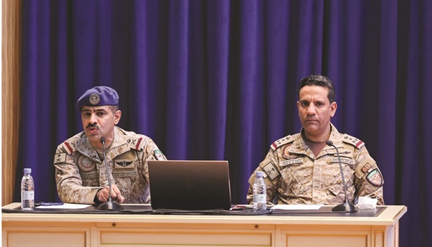 Major General Pilot Abdullah al-Hababi, Royal Saudi Air Force speaks during a news conference as coalition spokesperson, Brigadier General Turki al-Malki looks on, in Riyadh, yesterday.