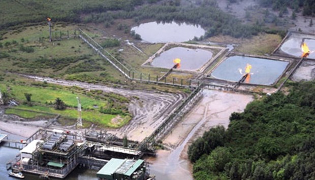 A file photo taken on March 22, 2013 shows an aerial view of Shell Cawtharine channels at Awoba in the Niger Delta. About $1.3tn has been wiped off the value of oil companies around the world over the same period, forcing them to lay off workers or cut dividends.