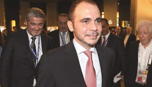 File picture of FIFA presidential hopeful Prince Ali bin al-Hussein of Jordon (C).