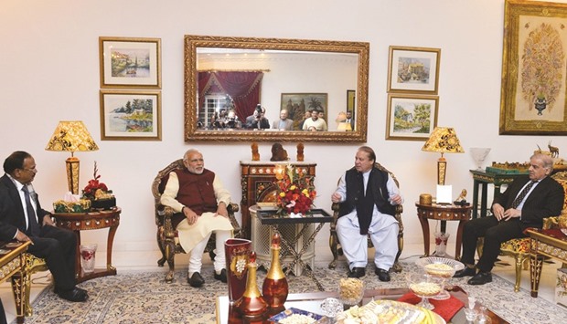 Pakistan Prime Minister Nawaz Sharif and his brother Shahbaz Sharif holding talks with Indian Prime Minister Narendra Modi, at Lahore, on December 25.