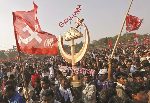 Supporters of the Communist Party of India (Marxist) carry a replica of their party symbol during a rally in Kolkata yesterday. Thousands of CPM supporters and its leaders gathered on the first day of their four-day-long plenum in Kolkata yesterday.