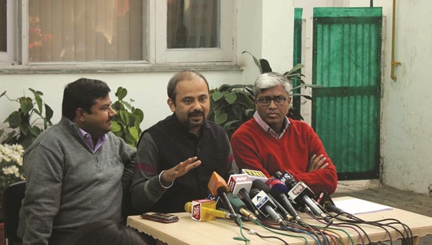 AAP leaders Dilip Pandey and Ashutosh address a press conference in New Delhi yesterday.
