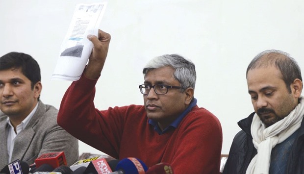 AAP leader Ashutosh shows the letter purportedly written by Jaitley, at a press conference in New Delhi yesterday.