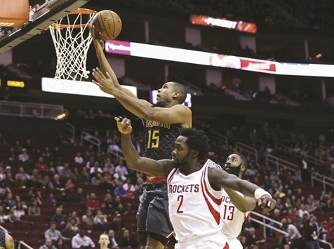 Atlanta Hawks center Al Horford (left) scores during the game against the Houston Rockets in Houston, Texas, on Tuesday. (USA TODAY Sports)
