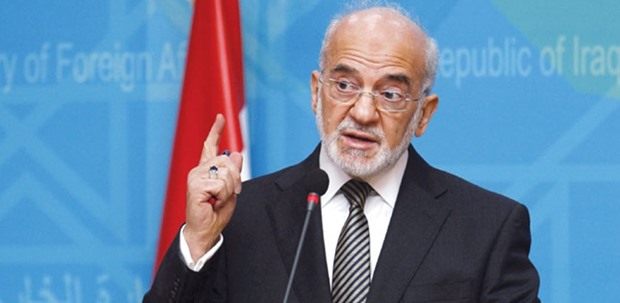 Iraqi Foreign Minister Ibrahim al-Jaafari speaks to reporters during a news conference in Baghdad yesterday.
