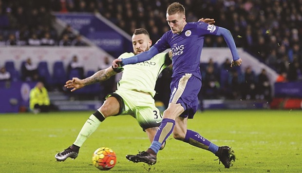 Leicester Cityu2019s Jamie Vardy shoots at goal past defender Nicolas Otamendi of Manchester City during the EPL match on Wednesday. (Reuters)