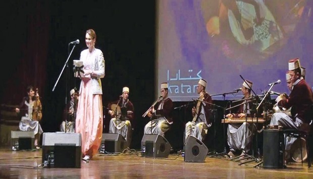 Lila Borsali performs on stage.