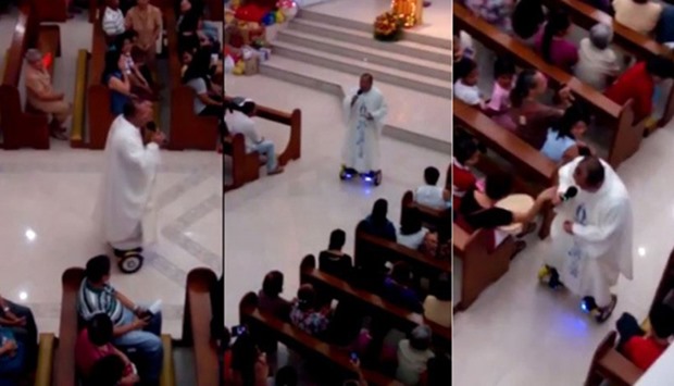 Sidelined Philippine priest 'sorry' after hoverboard Mass stunt