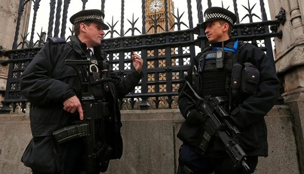 Armed police pictured outside the Parliament.