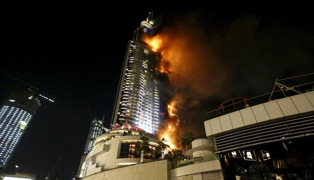 A fire engulfs The Address Hotel in downtown Dubai on Thursday.