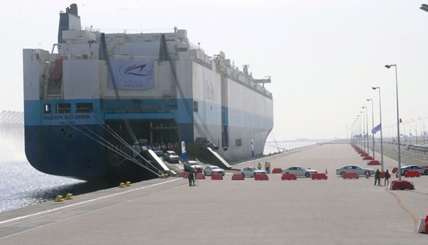 A ship unloads vehicles at Hamad Port. Qataru2019s u201cbudget validates the governmentu2019s keenness to contin