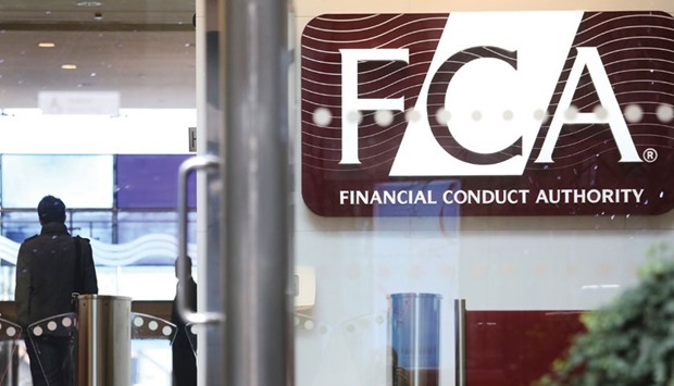 A logo is seen at the headquarters of the Financial Conduct Authority (FCA) in the Canary Wharf business district in London (file). After announcing plans for a thematic review of banking culture in March, the FCA had undertaken initial work on the project, before deciding that publishing the report was not the most effective way to handle the issue, a source says.