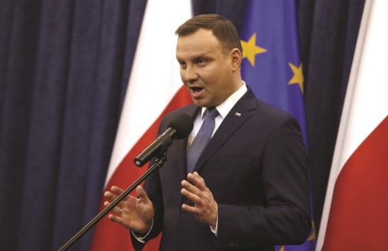 Polandu2019s President Andrzej Duda speaks during his announcement at Presidential Palace in Warsaw on December 28. Duda signed into law an amendment to how its constitutional court makes rulings, a move critics say will erode checks and balances in government powers and paralyse the highest judicial body.