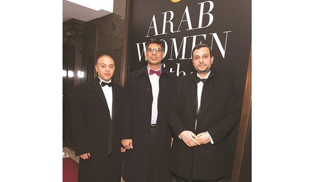 QCUKu2019s deputy director-general Fadi Itani (far right) with project manager Belgacem Kahlalech and development manager Salman Mujtaba at the Arab Women of the Year 2016 awards.
