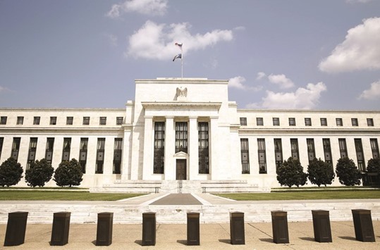 The Federal Reserve building is seen in Washington. The Fed intends to raise US interest rates and may hike as early as this month.