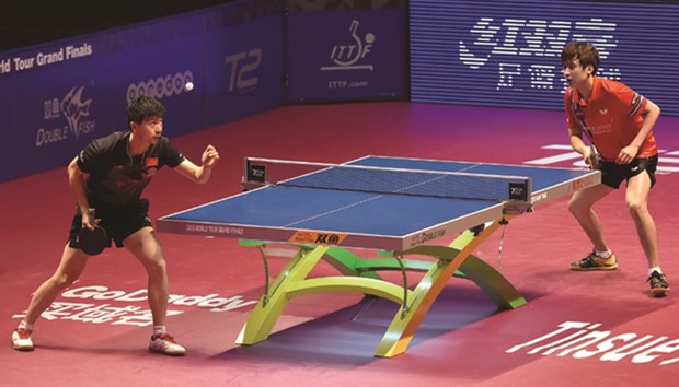 Chinau2019s Ma Long (left) in action during his semi-final against Jeoung Youngsik of South Korea. Long won 4-0.