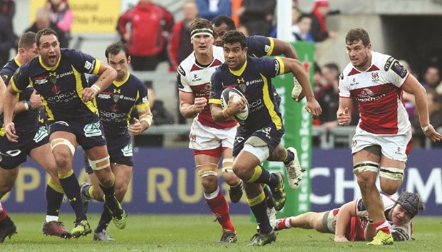 Clermontu2019s French centre Wesley Fofana (3rd R) runs with the ball during the European Rugby Champions Cup rugby union match against Ulster at Kingspan Stadium in Belfast yesterday. (AFP)