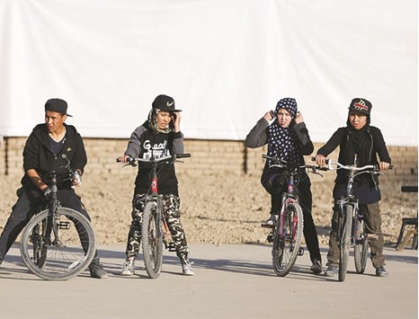 Afghan young cyclists prepare themselves before an exercise in Kabul.