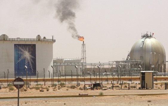 A gas flame is seen in the desert near the Khurais oilfield, Saudi Arabia (file). The worldu2019s top oil exporter told Opec it pumped 10.72mn bpd last month, an Opec source said, up from 10.625mn bpd in October.