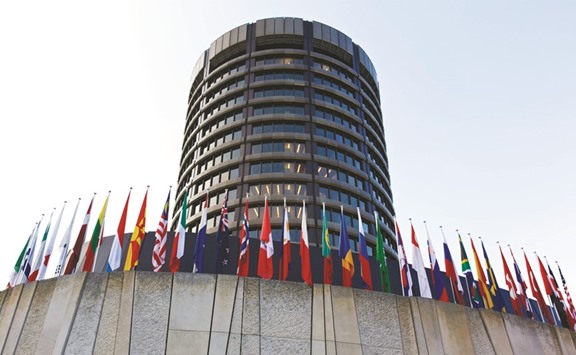 The headquarters of the Bank for International Settlements is seen in Basel, Switzerland. Electronic specialists are making waves by eclipsing major banks in foreign-exchange trading, according to the BIS.