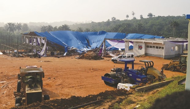 Heavy duty equipment and machinery are seen at the premises of the collapsed church in Uyo.