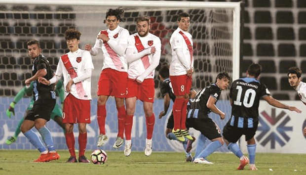 Al Rayyanu2019s Sebastian Soria (C) defends  with his teammates during their match against Al Wakrah yesterday. At bottom, action from the Al Gharafa-Al Sailiya match.