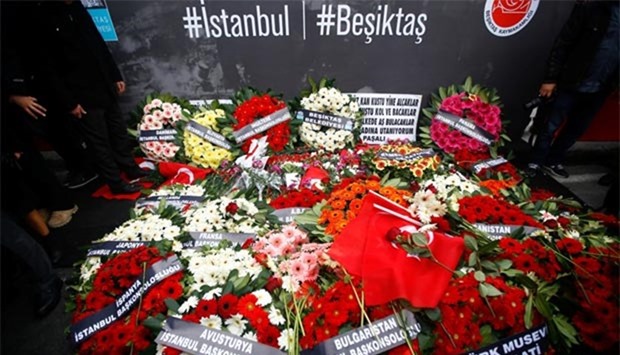 Wreaths, placed by representatives of foreign missions, are pictured at the scene of Saturday's blasts in Istanbul on Monday.