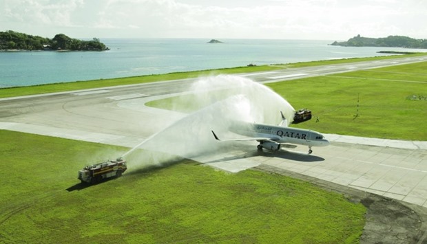 The Seychelles welcomes the first Qatar Airways flight with a traditional water cannon salute