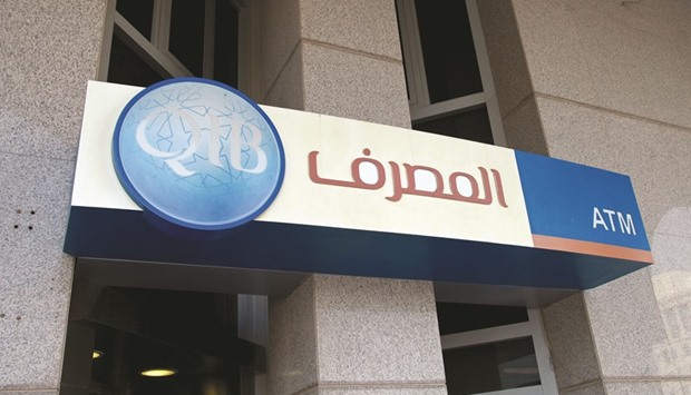 A logo is seen outside an ATM operated by QIB in Doha. The latest award recognises QIBu2019s continuous growth and impact on the Islamic banking industry.