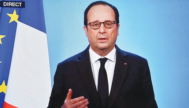 A photo taken off a TV screen yesterday shows Hollande delivering an official statement at the Elysee Palace. The French president has announced that he will not stand for re-election.